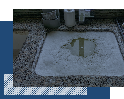 A clogged kitchen sink
