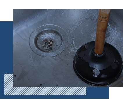 A plunger and a sink drain