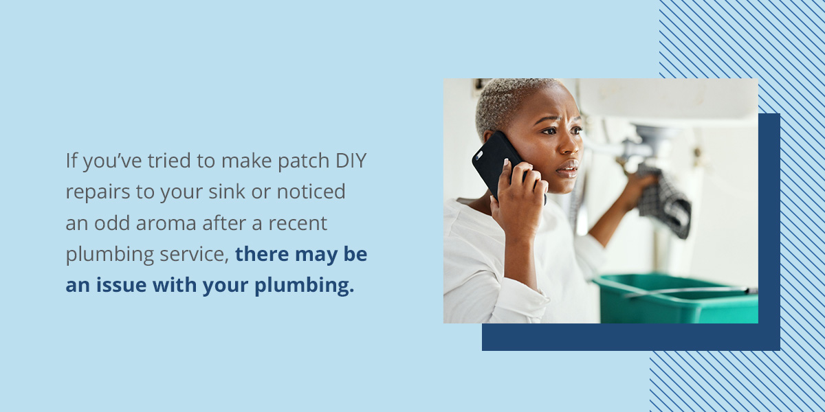 woman calling plumber because she tried to fix her drain herself and now there is an odor coming from her drain